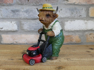 Highland Cow Mowing Lawn Ornament