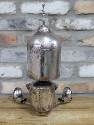 Albie the Sitting Silver Robot