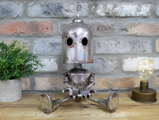 Albie the Sitting Silver Robot